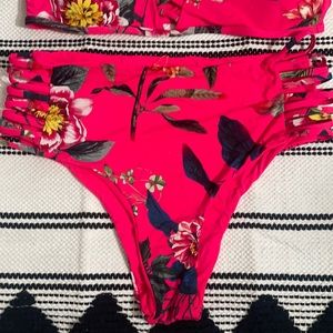 Pink floral swim suit, never worn. Size Large